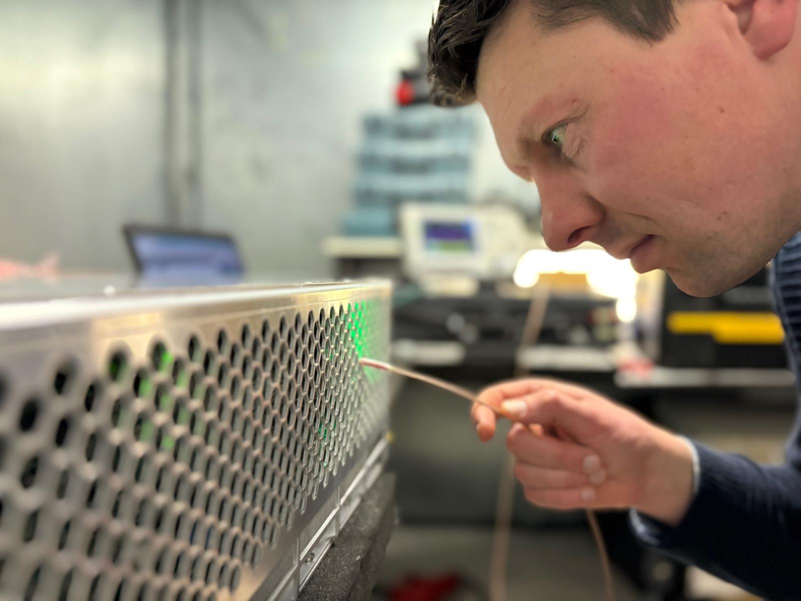 Joost Brilman with probe in EMC lab